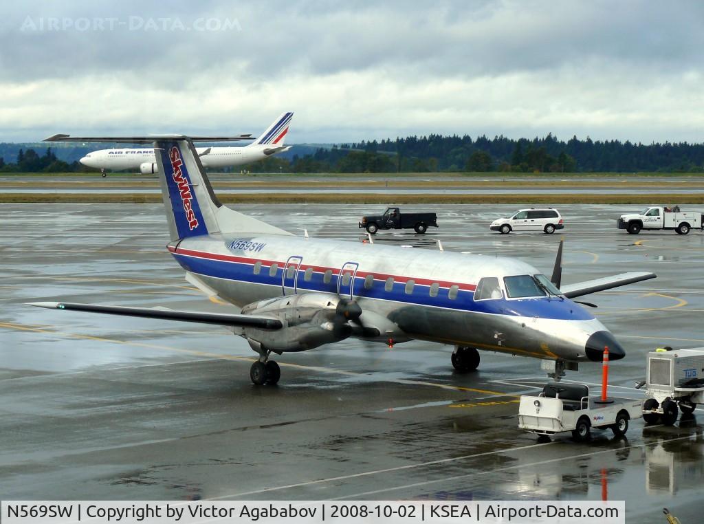 N569SW, 1998 Embraer EMB-120ER Brasilia C/N 120344, At Seattle Tacoma. Engine 2 is running, preparing to start engine 1 :)