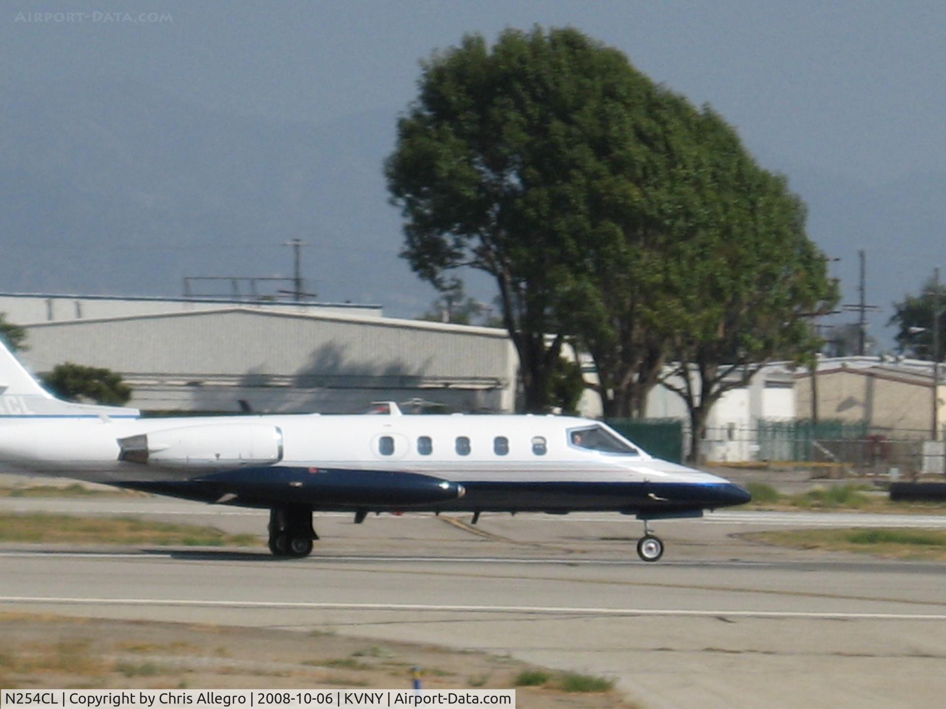 N254CL, 1979 Gates Learjet 25D C/N 275, Lacy Lear taking off RWY 16R