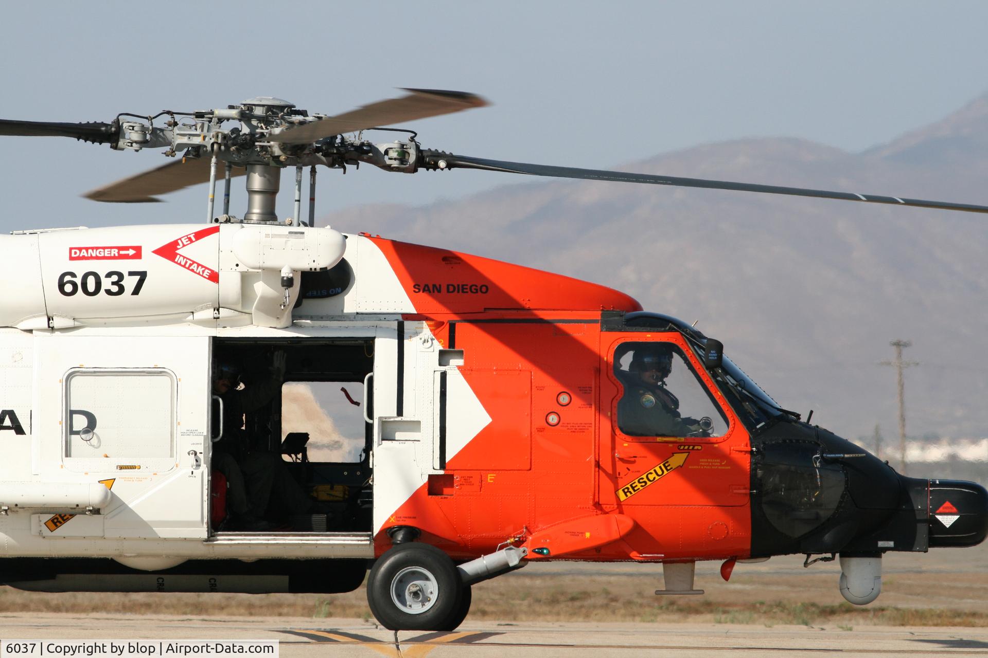 6037, 1970 Sikorsky MH-60J Jayhawk C/N 70.1958, smile your on candid camera