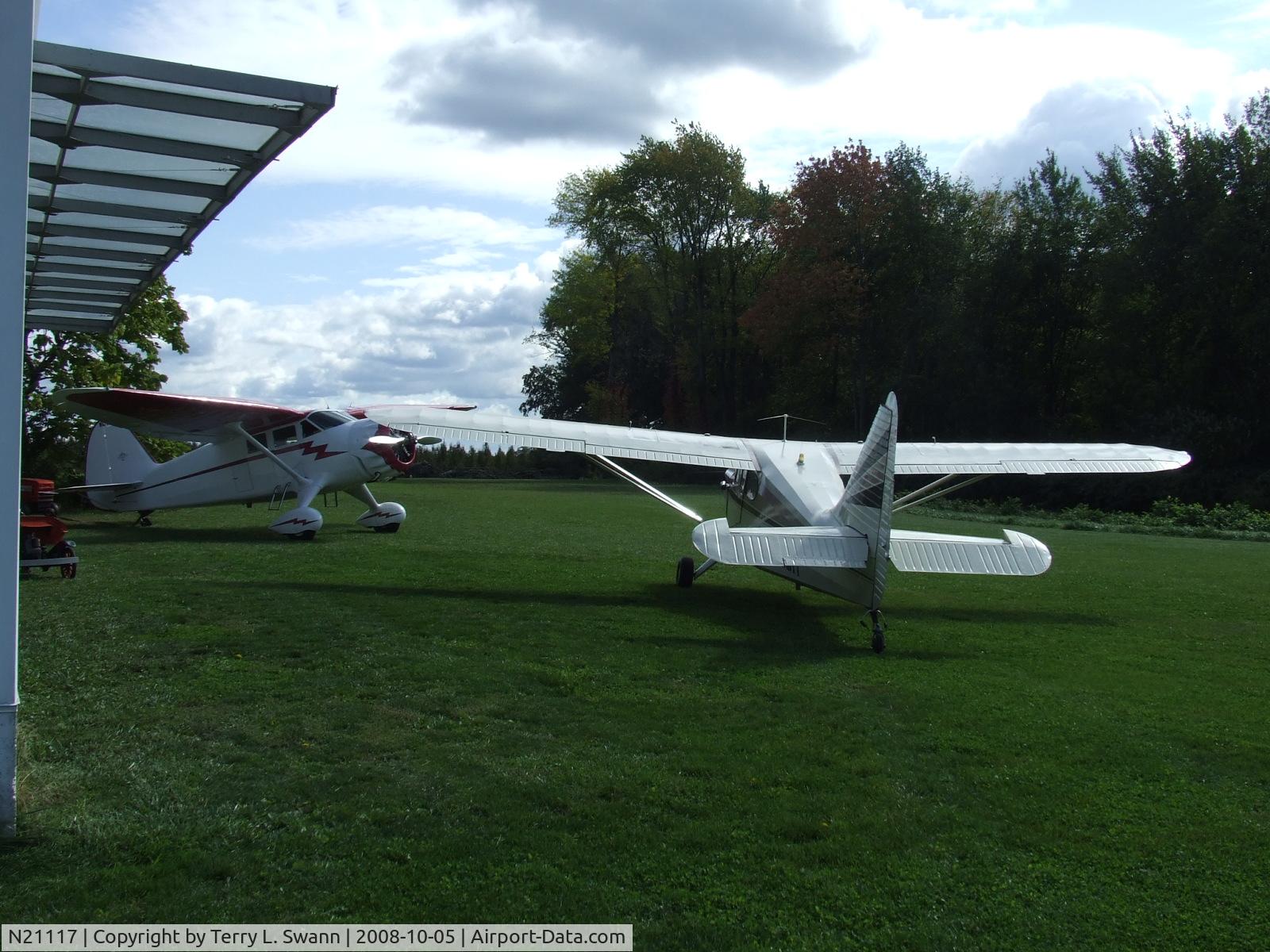 N21117, 1939 Stinson SR-9C Reliant C/N 5371, Two Stinsons parked and waiting