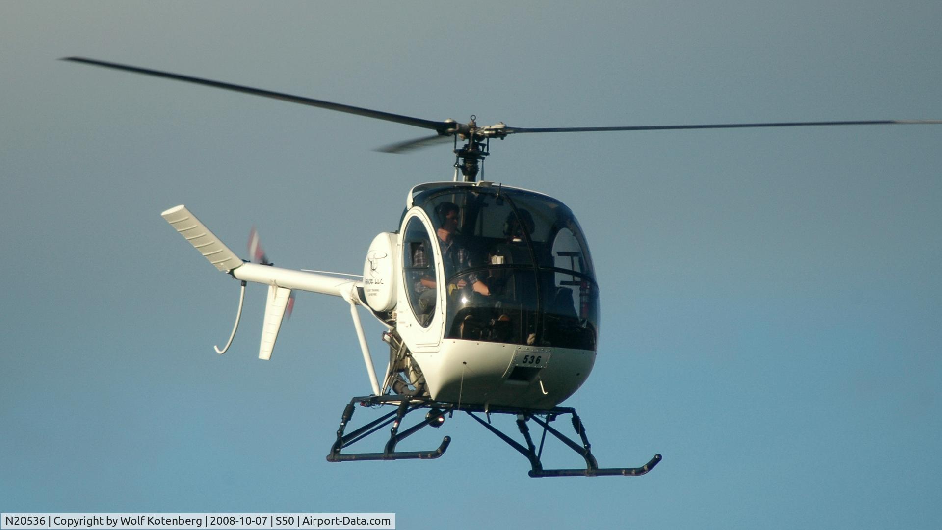 N20536, 2001 Schweizer 269C C/N S1818, flying the pattern on a windy day