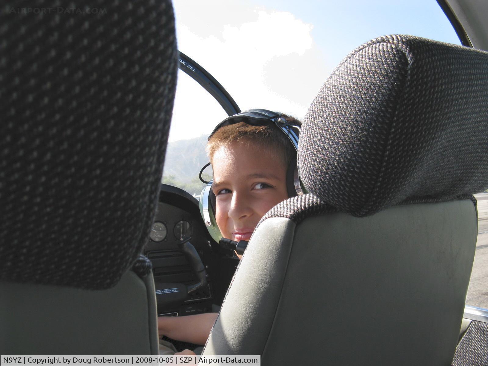 N9YZ, 1975 Grumman American AA-5A Cheetah C/N AA5-0822, 1975 Grumman American AA-5A CHEETAH, Lycoming O-320 150 Hp, aboard Young Eagles Flight from SZP, happy kid after landing