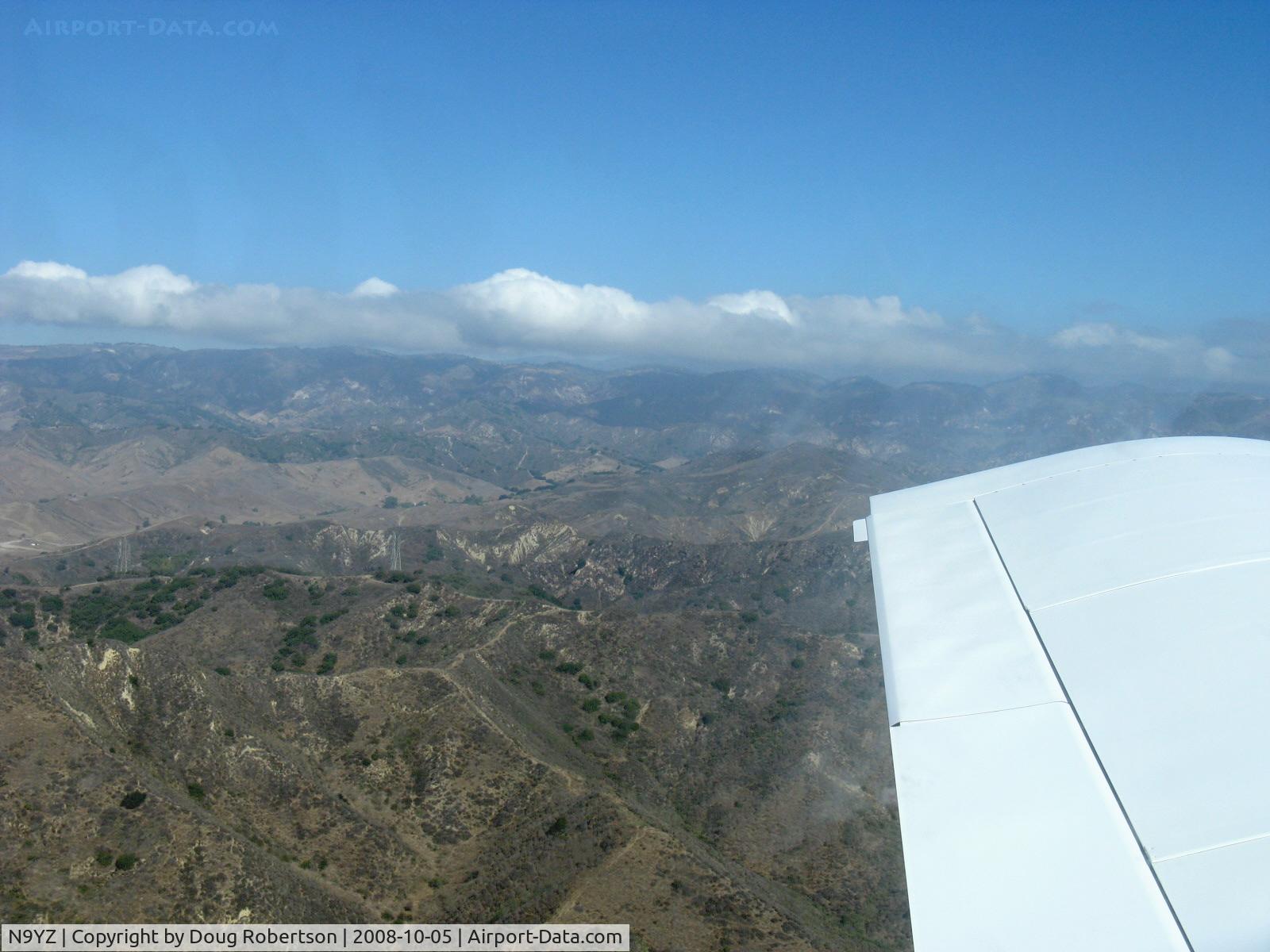 N9YZ, 1975 Grumman American AA-5A Cheetah C/N AA5-0822, Mountains north of Santa Paula, California during Young Eagles Flight