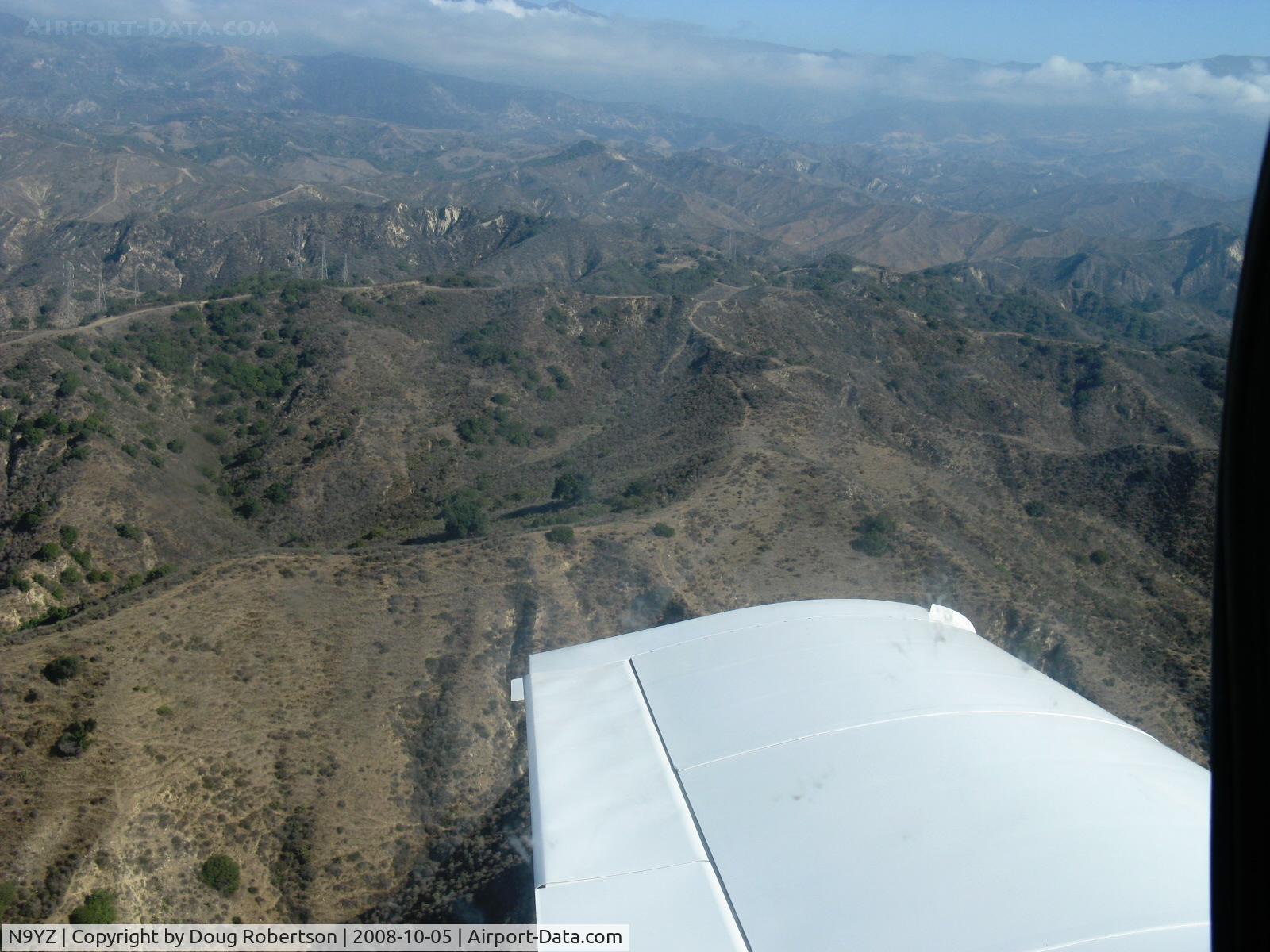 N9YZ, 1975 Grumman American AA-5A Cheetah C/N AA5-0822, Mountains north of Santa Paula, California during Young Eagles Flight