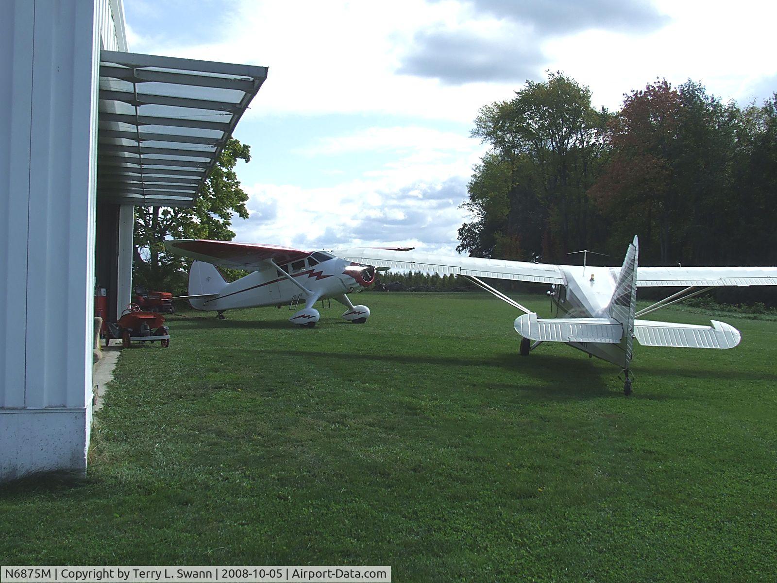 N6875M, 1948 Stinson 108-3 Voyager C/N 108-4875, Both stinson's at their home field.