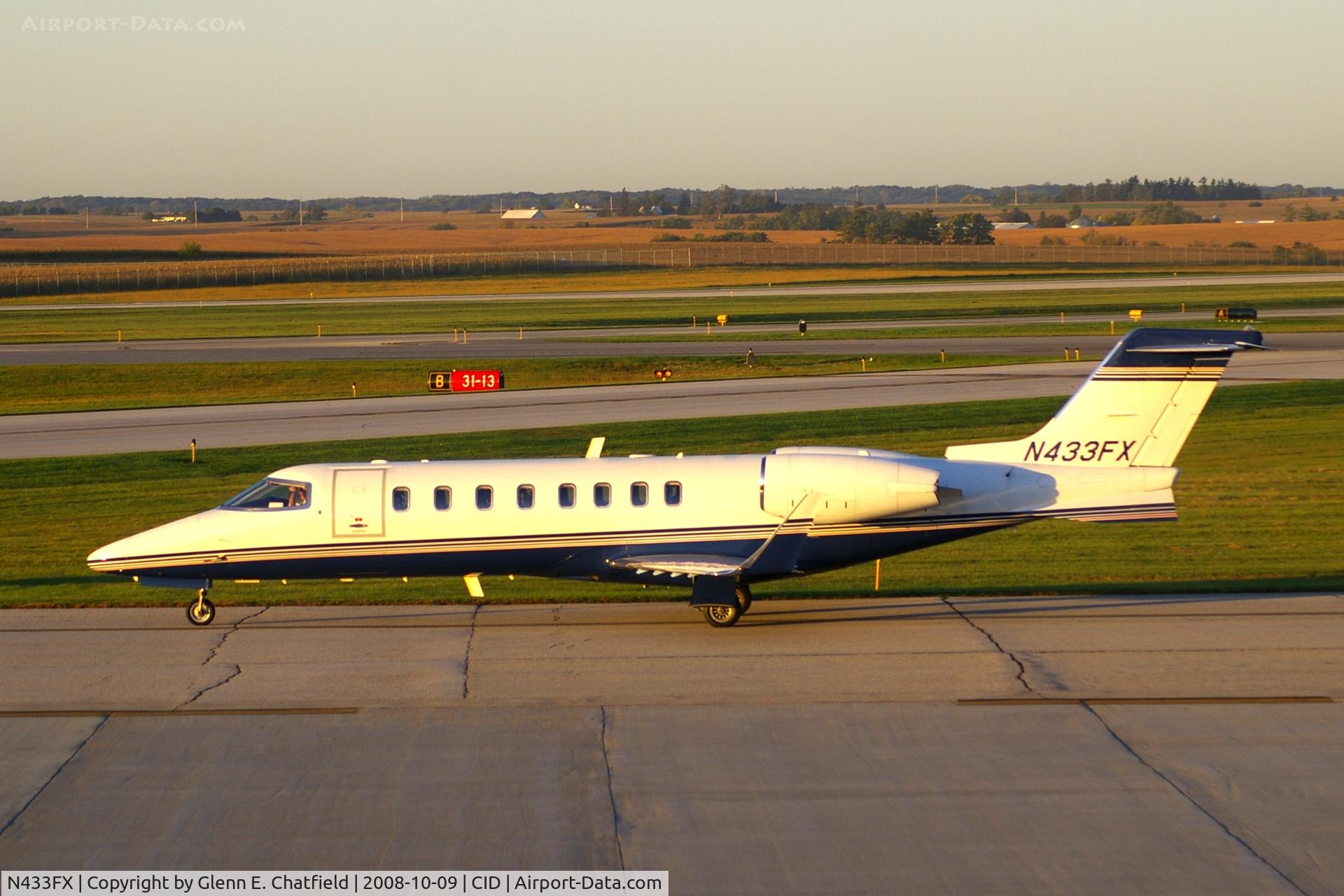 N433FX, 2002 Learjet 45 C/N 192, FlexJet taxiing to Runway 27 for departure, not long after sunrise.