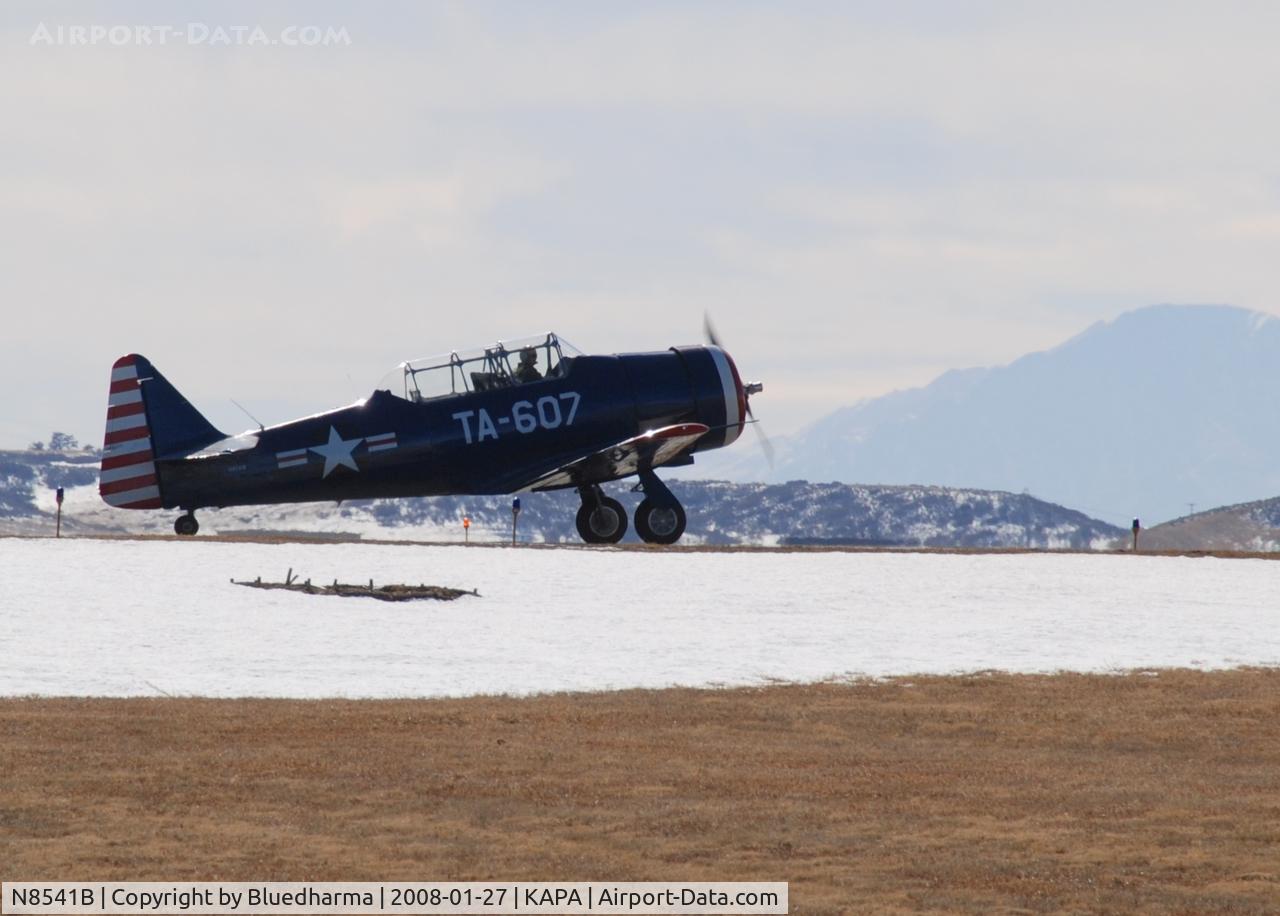N8541B, 1943 North American T-6D C/N 41-34607-1, Position and Hold for 17L , Pikes peak in the distance.