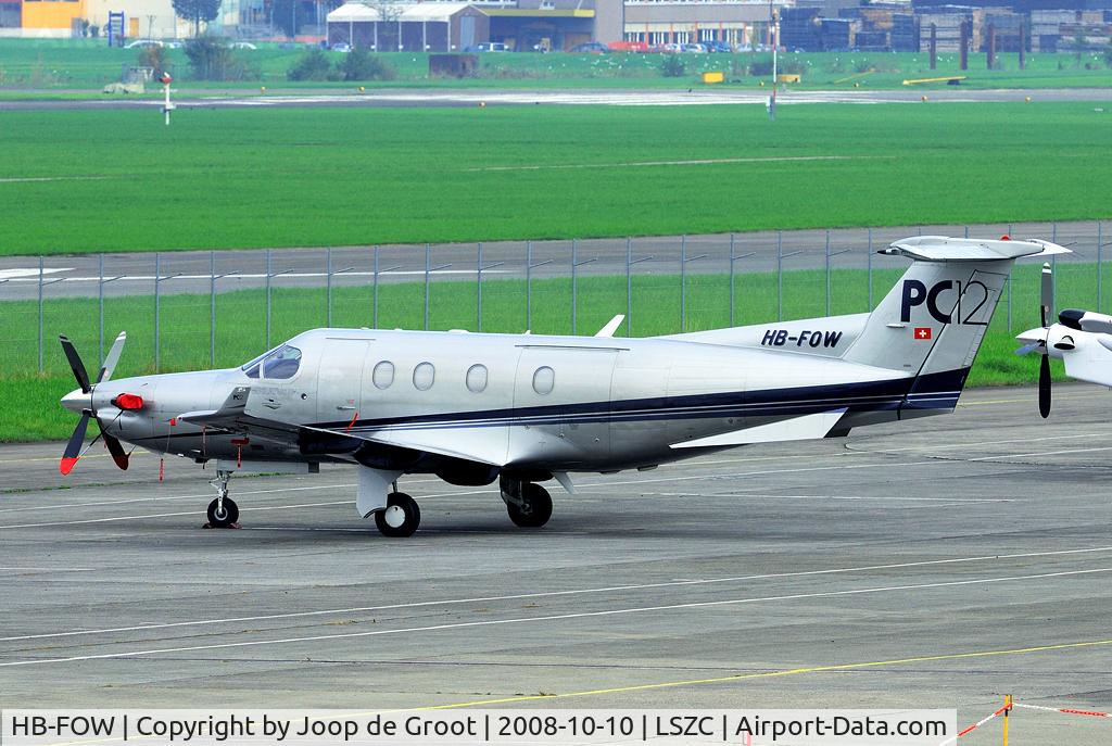 HB-FOW, 2001 Pilatus PC-12/45 C/N 411, Seenon the former military flightline, that is in use by Pilatus nowadays.