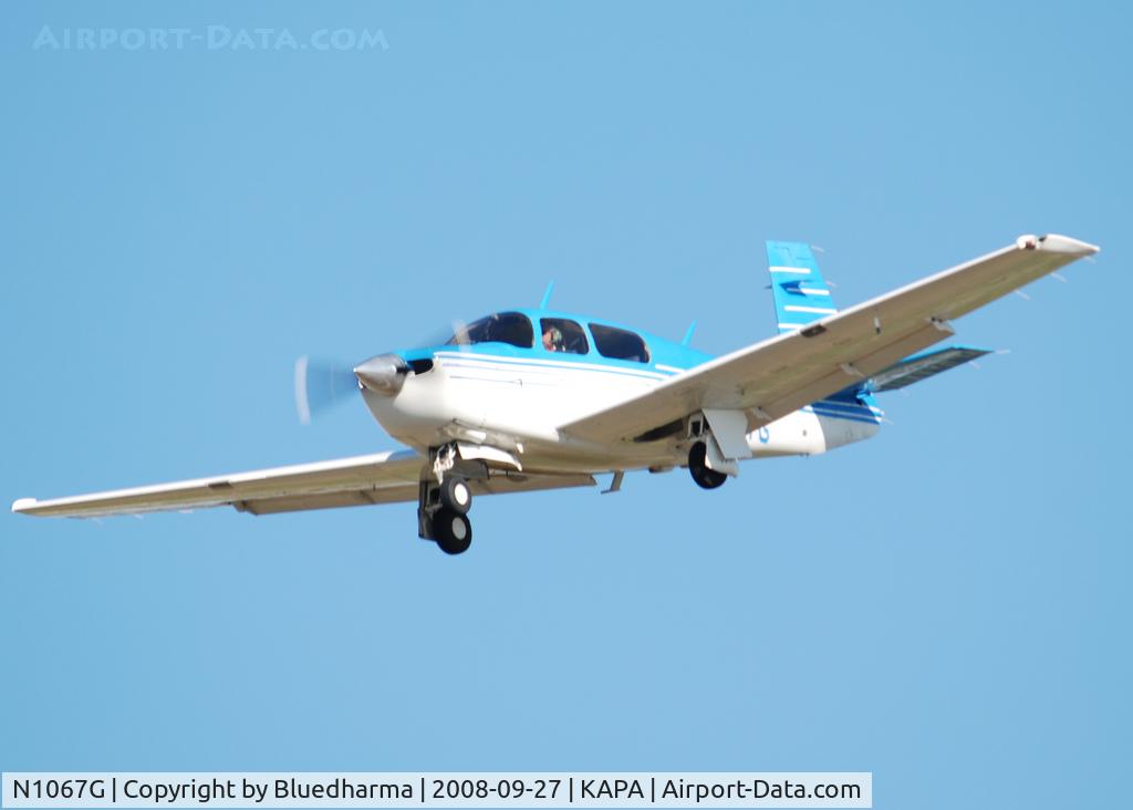 N1067G, 1990 Mooney M20J 201 C/N 24-3174, On final for 17L.