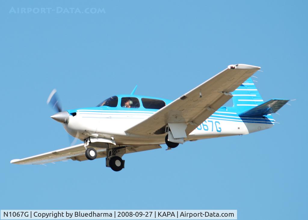 N1067G, 1990 Mooney M20J 201 C/N 24-3174, On final for 17L.