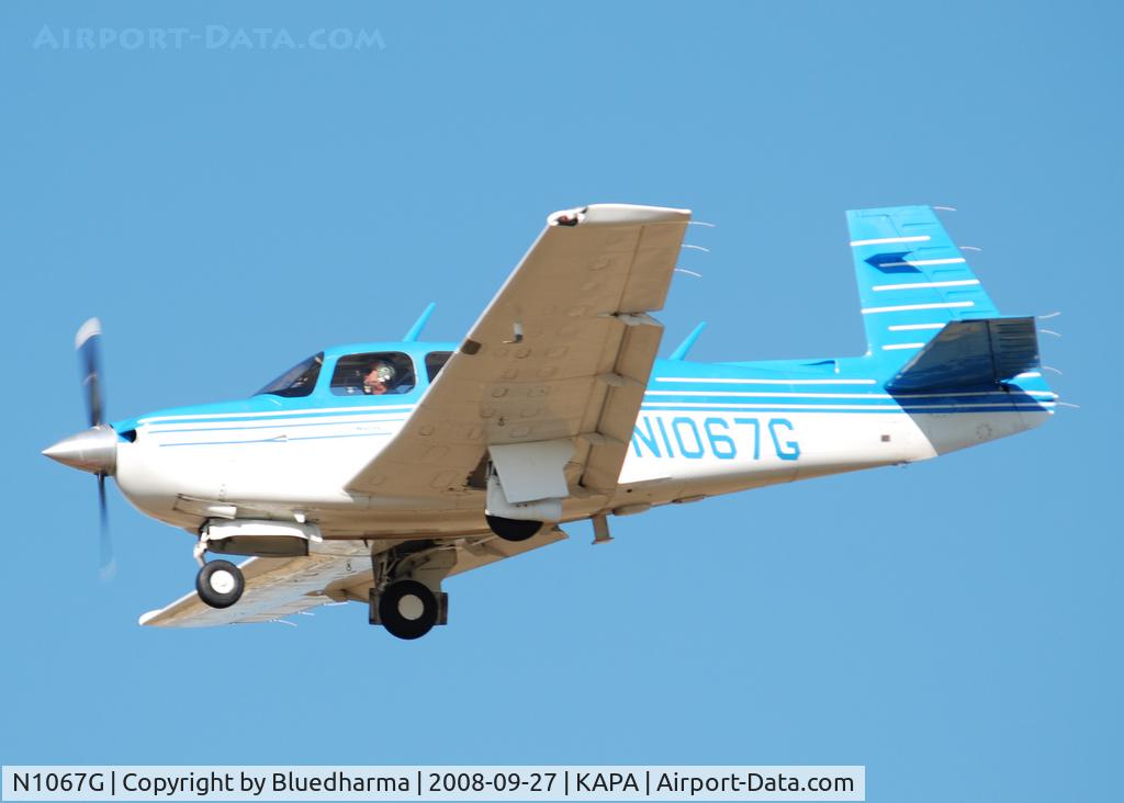 N1067G, 1990 Mooney M20J 201 C/N 24-3174, On final for 17L.