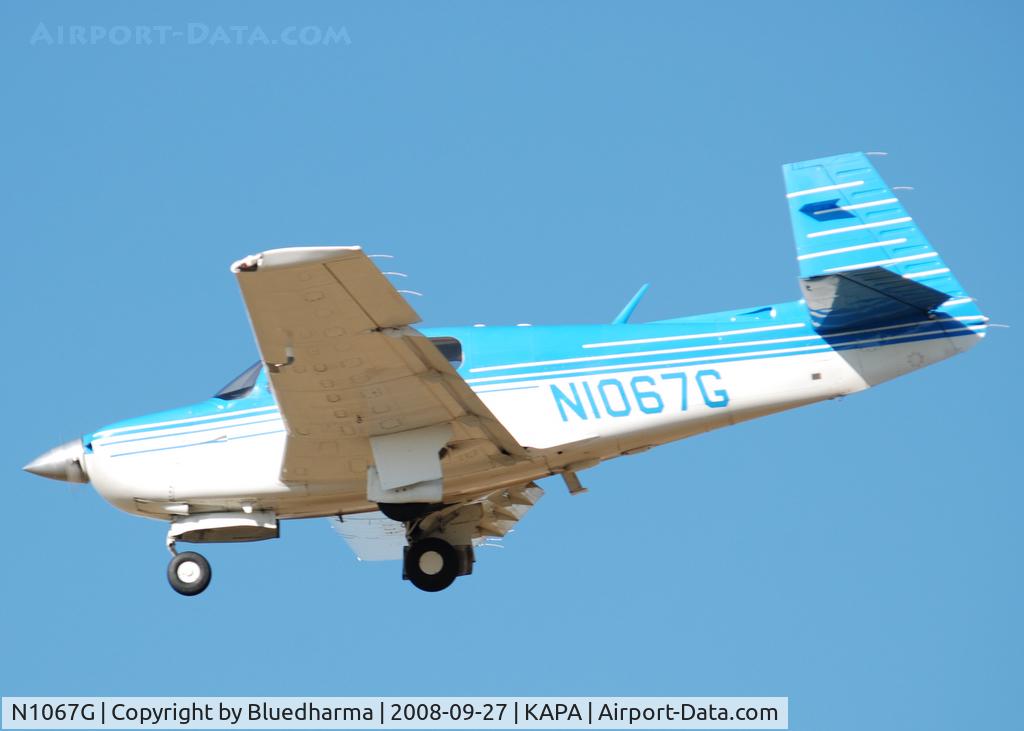 N1067G, 1990 Mooney M20J 201 C/N 24-3174, On final for 17L.
