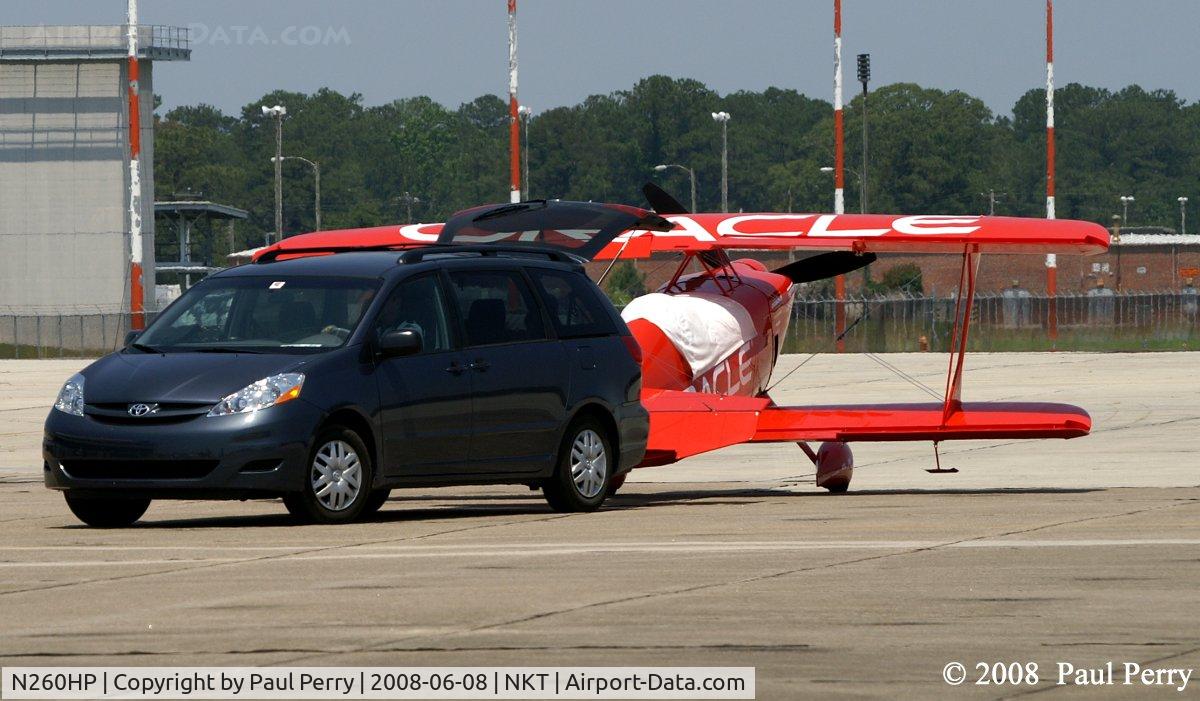 N260HP, 2010 Aviat Pitts S-1S C/N 0001, Being towed in by the minivan