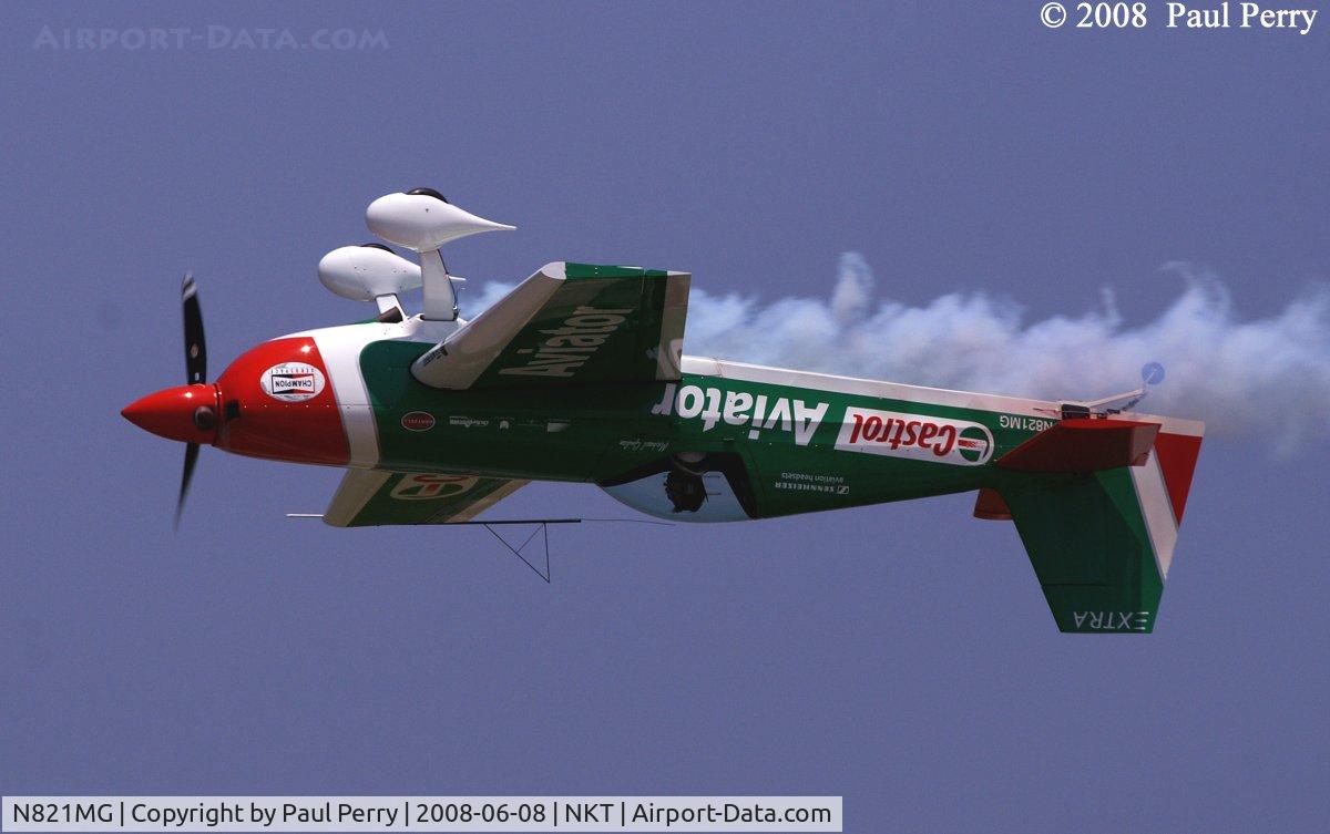 N821MG, 2006 Extra EA-300S C/N 1035, The Inverted Pass, with smoke of course