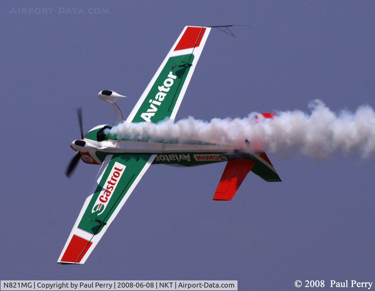 N821MG, 2006 Extra EA-300S C/N 1035, Showing off her belly