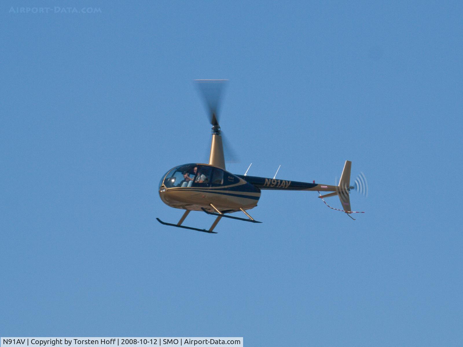 N91AV, 2006 Robinson R44 Raven II C/N 11392, N91AV arriving sbove RWY 21
