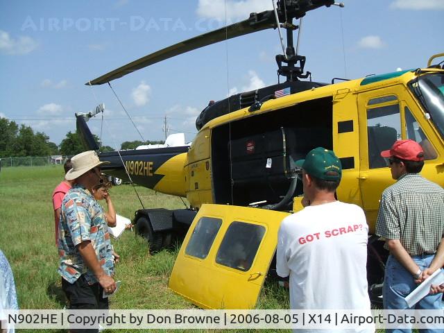 N902HE, 1967 Bell UH-1H Iroquois C/N 9594, Helicopter being sold at auction by closed LaBelle, Florida crop dusting company - location near the LaBelle airport on company grounds