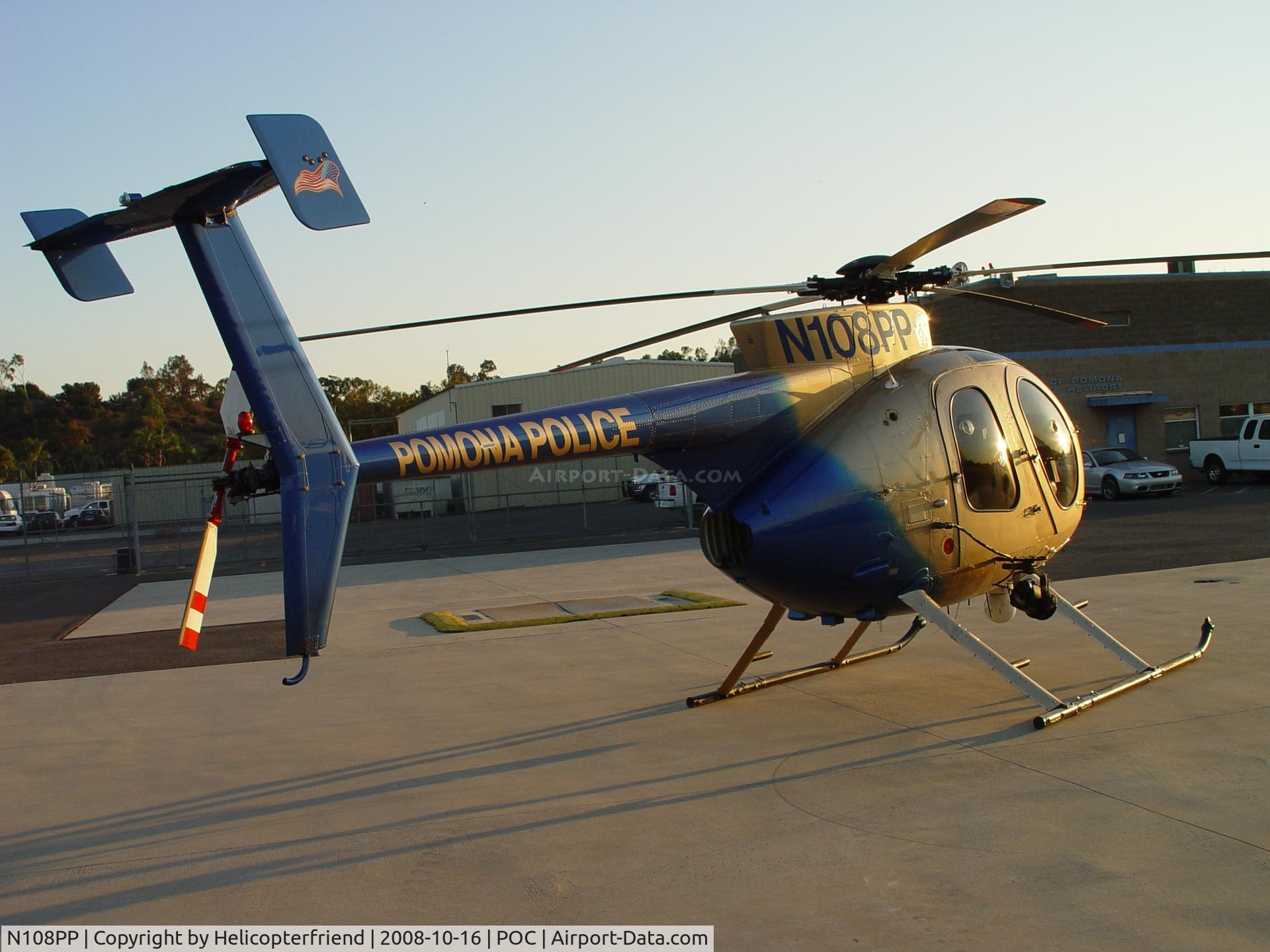 N108PP, 2008 MD Helicopters 369E C/N 0578E, Sun glancing off the ship at Brackett