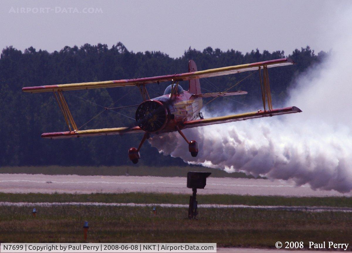 N7699, 1972 Grumman G-164A Show Cat C/N 1004, Gene Soucy in the low pass