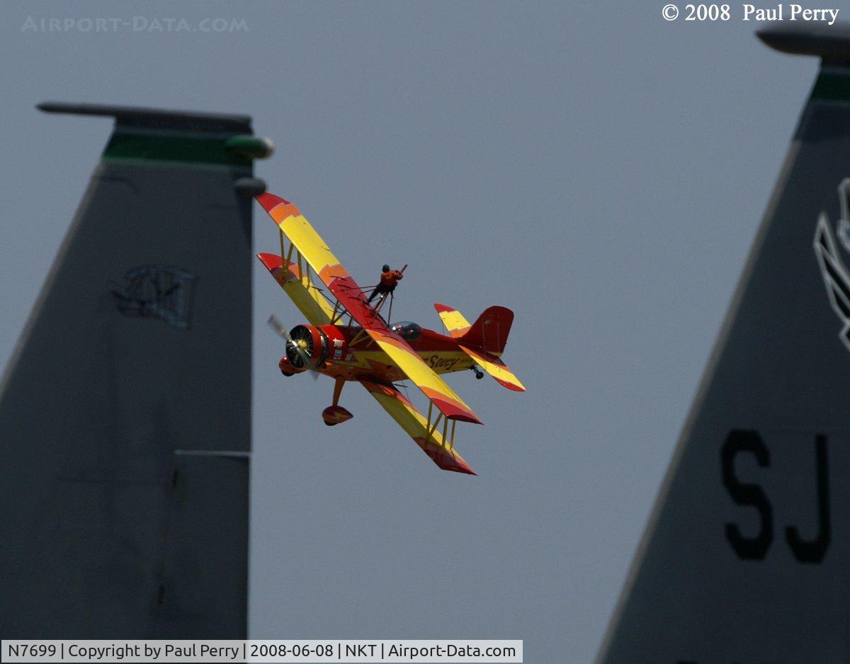 N7699, 1972 Grumman G-164A Show Cat C/N 1004, Framed up with the F-15E Demo Bird's tail