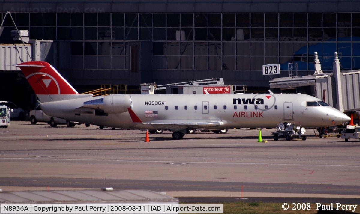N8936A, 2004 Bombardier CRJ-200 (CL-600-2B19) C/N 7936, With the right lighting, looks like a pearl white color as their base