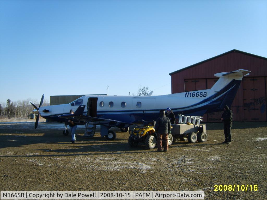 N166SB, 1999 Pilatus PC-12/45 C/N 310, Loading plane in Ambler, Alaska for return to Fairbanks.
