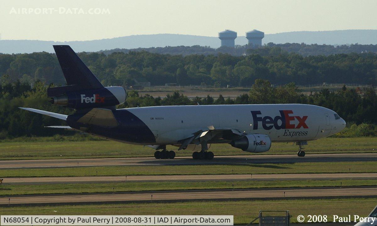 N68054, 1975 McDonnell Douglas MD-10-10F C/N 47808, Rolling out before making the turn to the taxiway