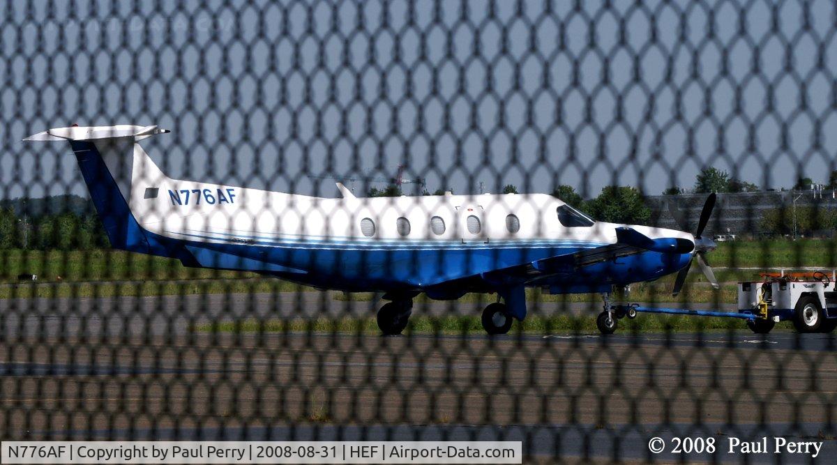 N776AF, 2006 Pilatus PC-12/47 C/N 776, Hooked up, ready for a tow to the terminal