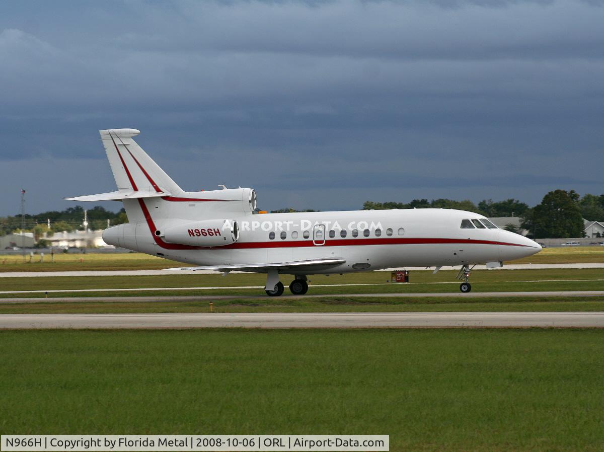 N966H, 2004 Dassault Falcon 900EX C/N 126, Falcon 900EX with storm in background