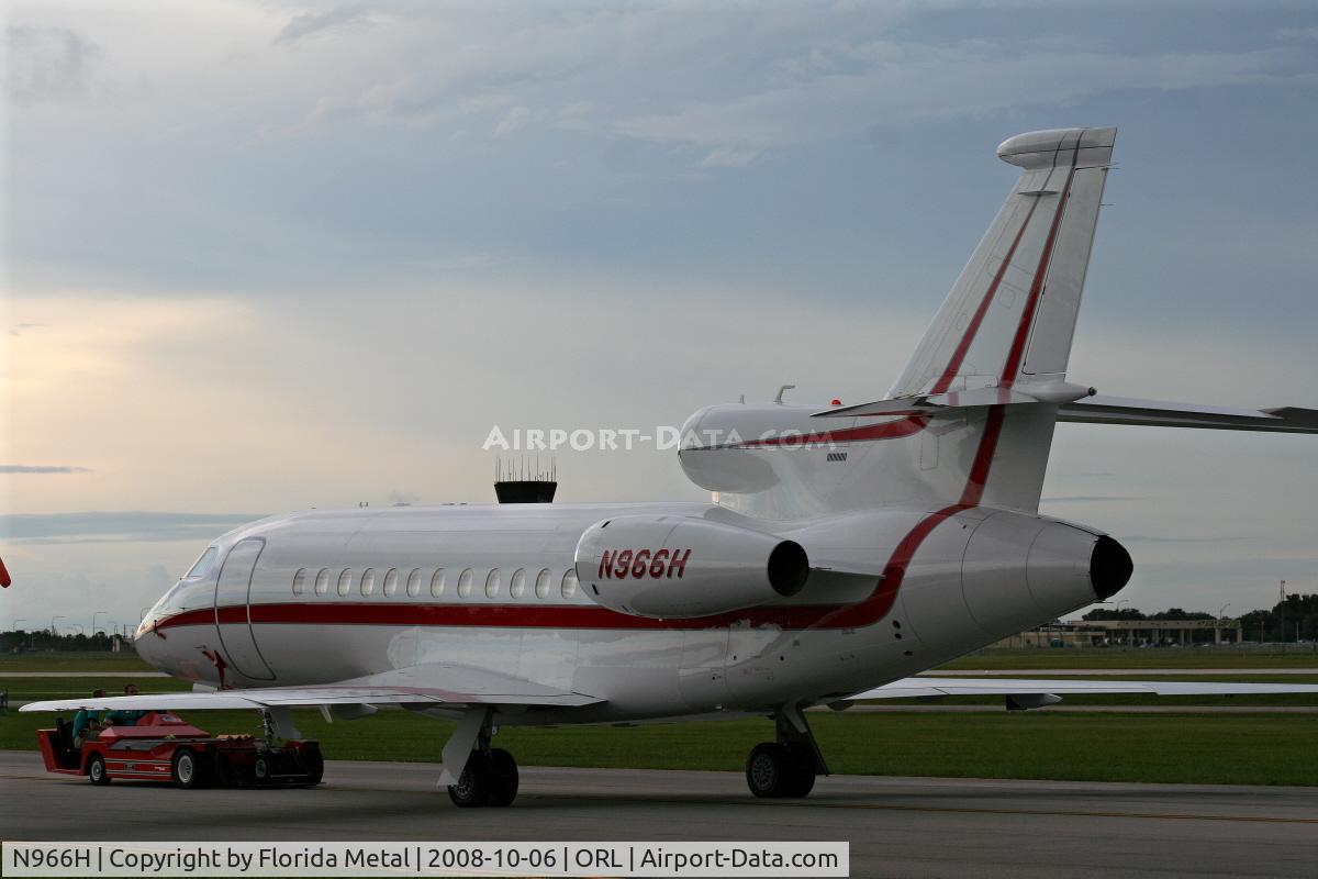 N966H, 2004 Dassault Falcon 900EX C/N 126, Falcon 900EX with storm in background