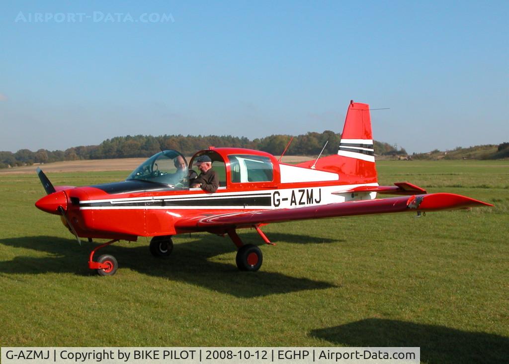 G-AZMJ, 1972 American Aviation AA-5 Traveler C/N AA5-0019, STRIKING SCHEME ON THIS THE FIRST UK REGISTERED AA-5