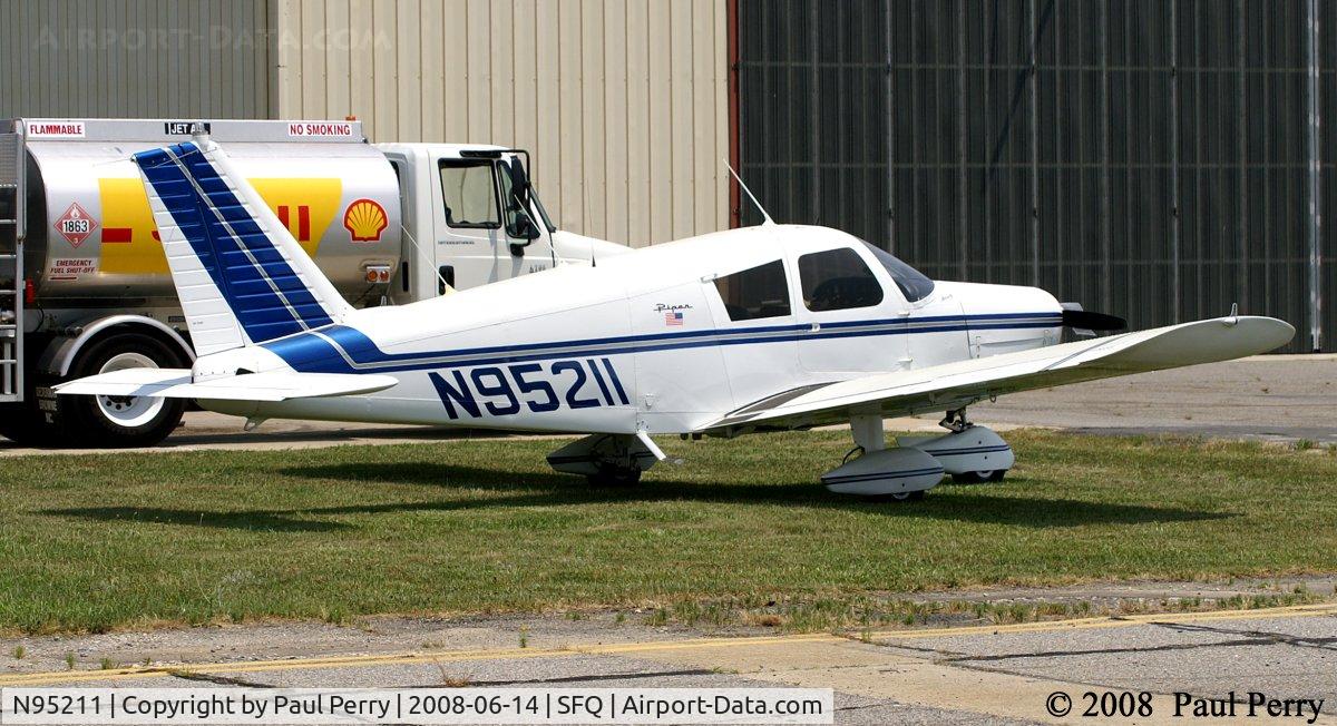 N95211, 1969 Piper PA-28-140 C/N 28-25843, Unobtrusively parked away from the crowds