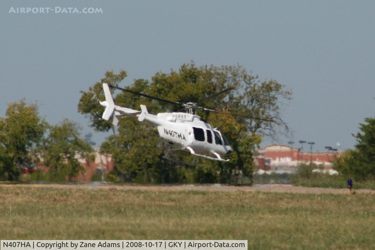 N407HA, 1996 Bell 407 C/N 53065, At Arlington Municipal - though shot through the heat.