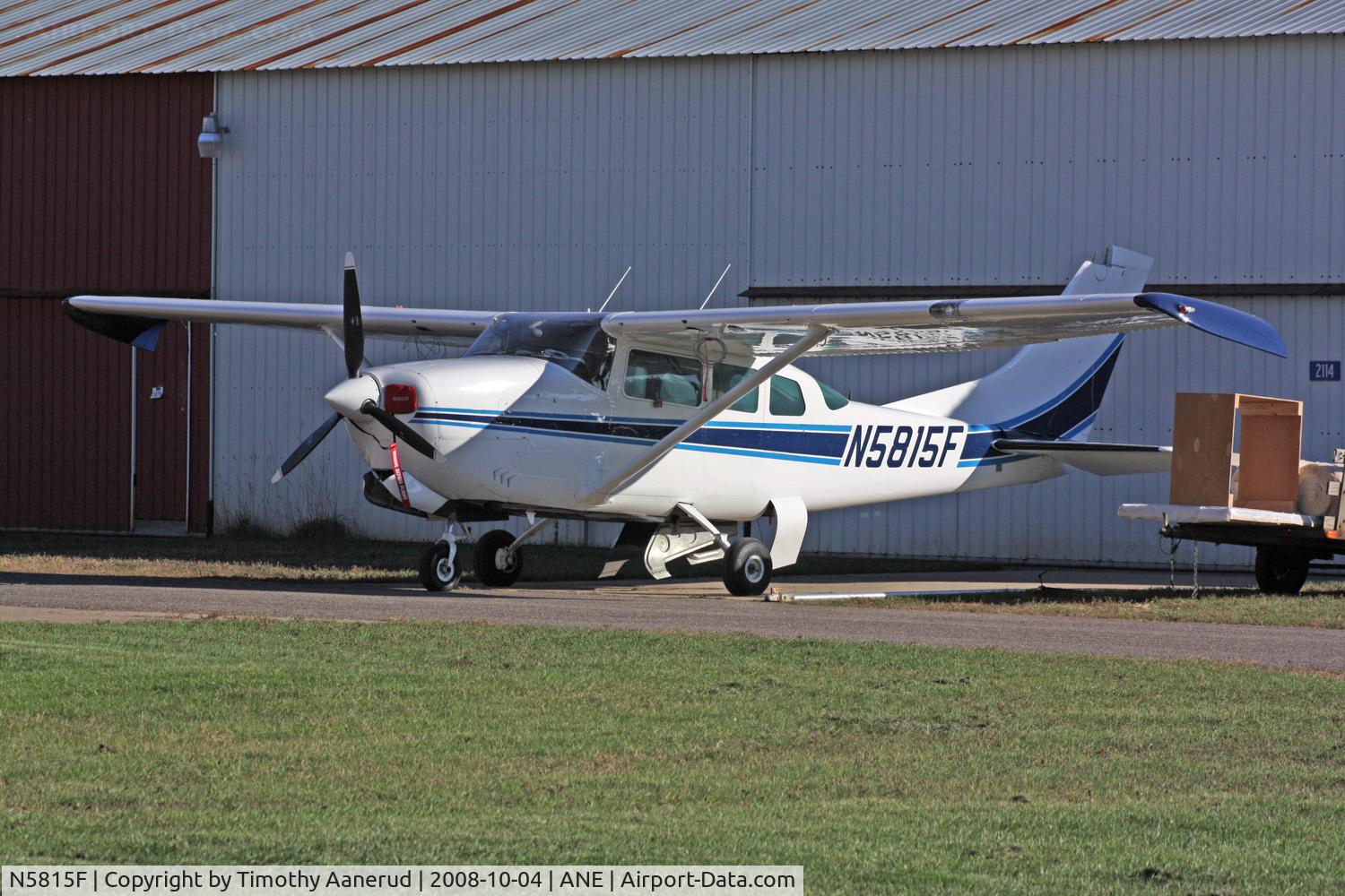 N5815F, 1966 Cessna 210F Centurion C/N 21058815, It's unusual to see the main landing gear doors hanging down on a Cessna 210, serial 21058815