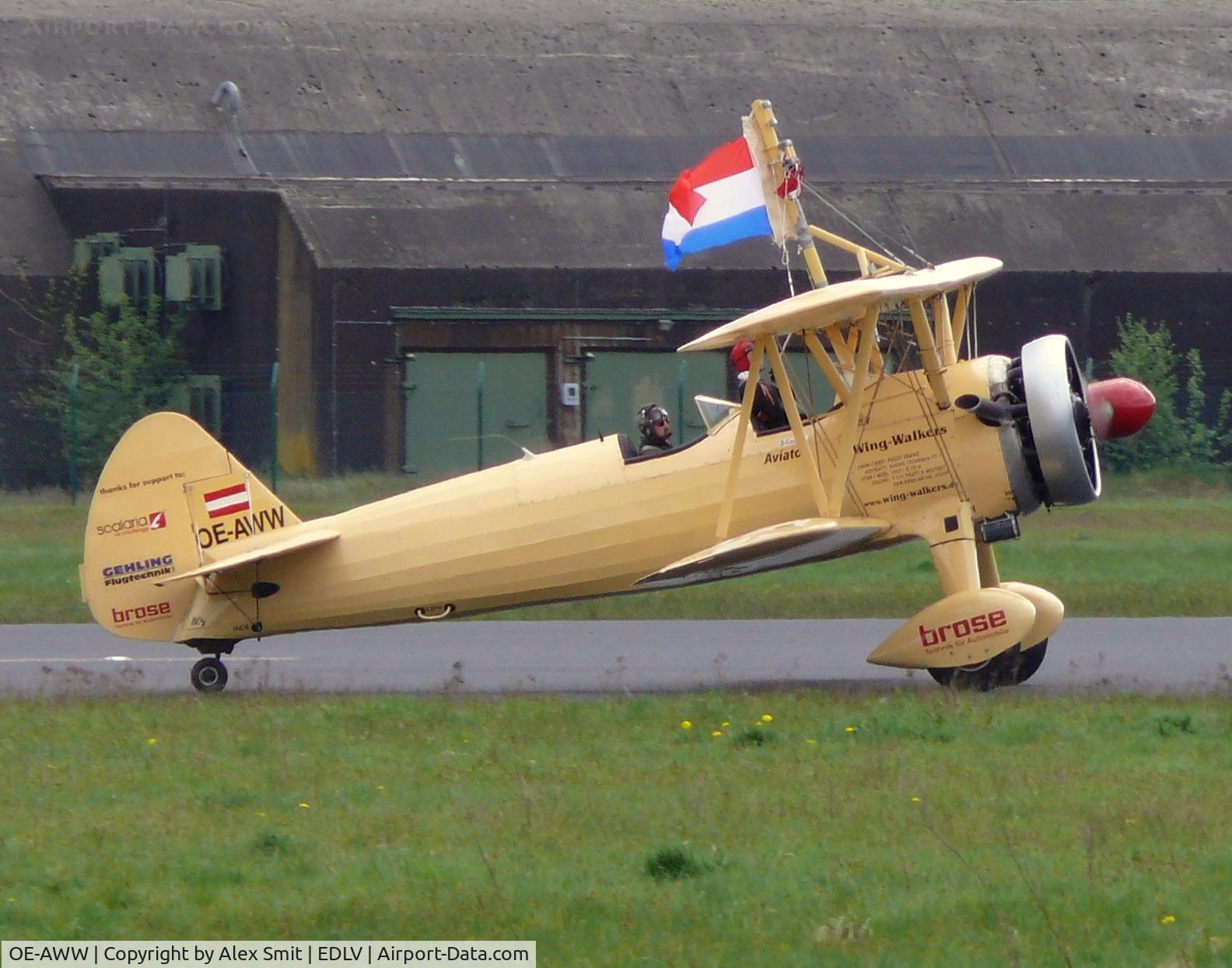 OE-AWW, 1943 Boeing N2S-5 Kaydet (E75) C/N 75-5386, Boeing PT-17 Stearman Kaydet OE-AWW Peggy Krainz the Wingwalker flying the Dutch tricolor at a German show