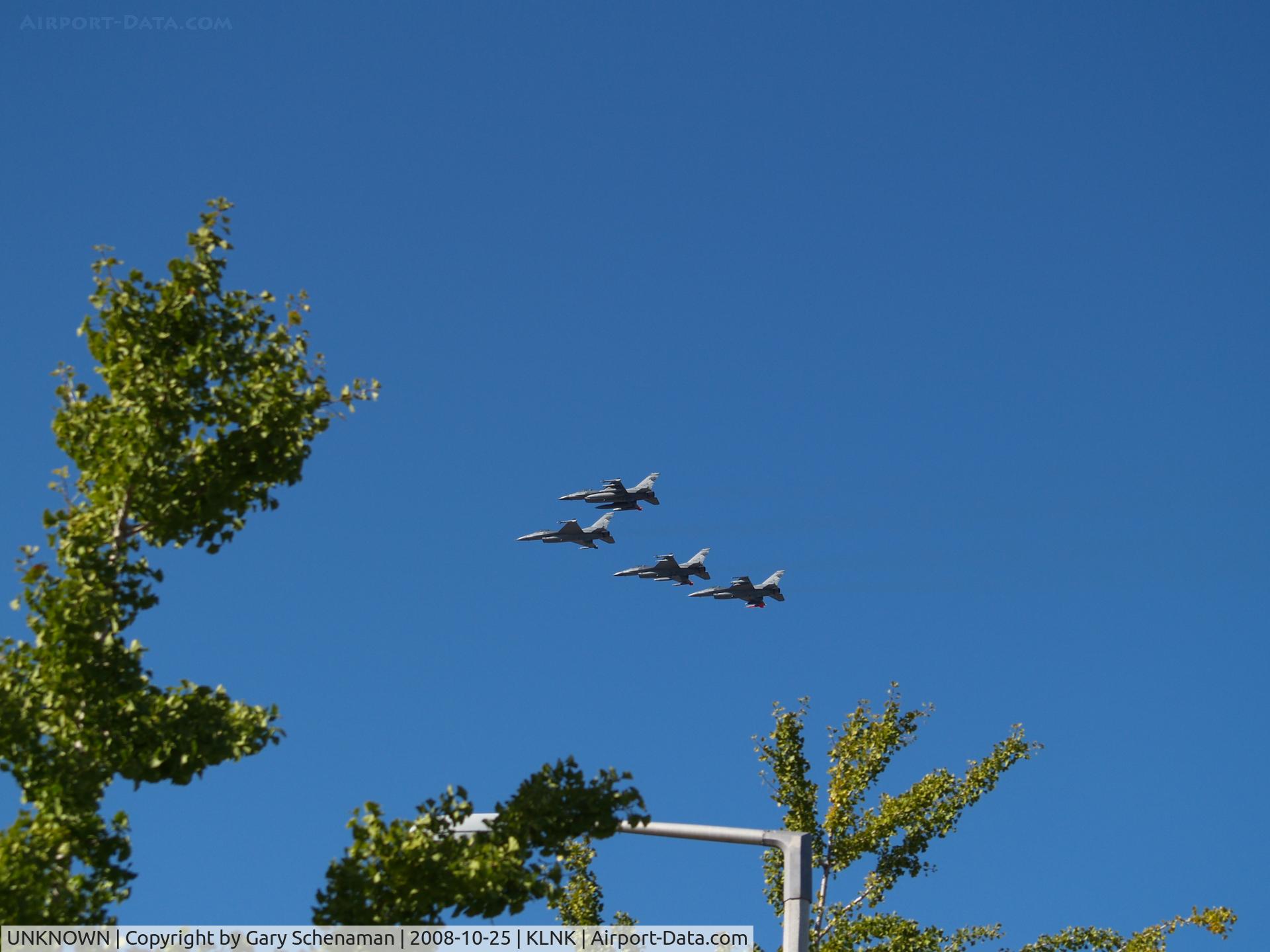 UNKNOWN, , F-16'S IN FORMATION OVER MEMORIAL STADUIM FIGHTING FALCON FROM SOUTH DAKOTA LOBOS SQUAD