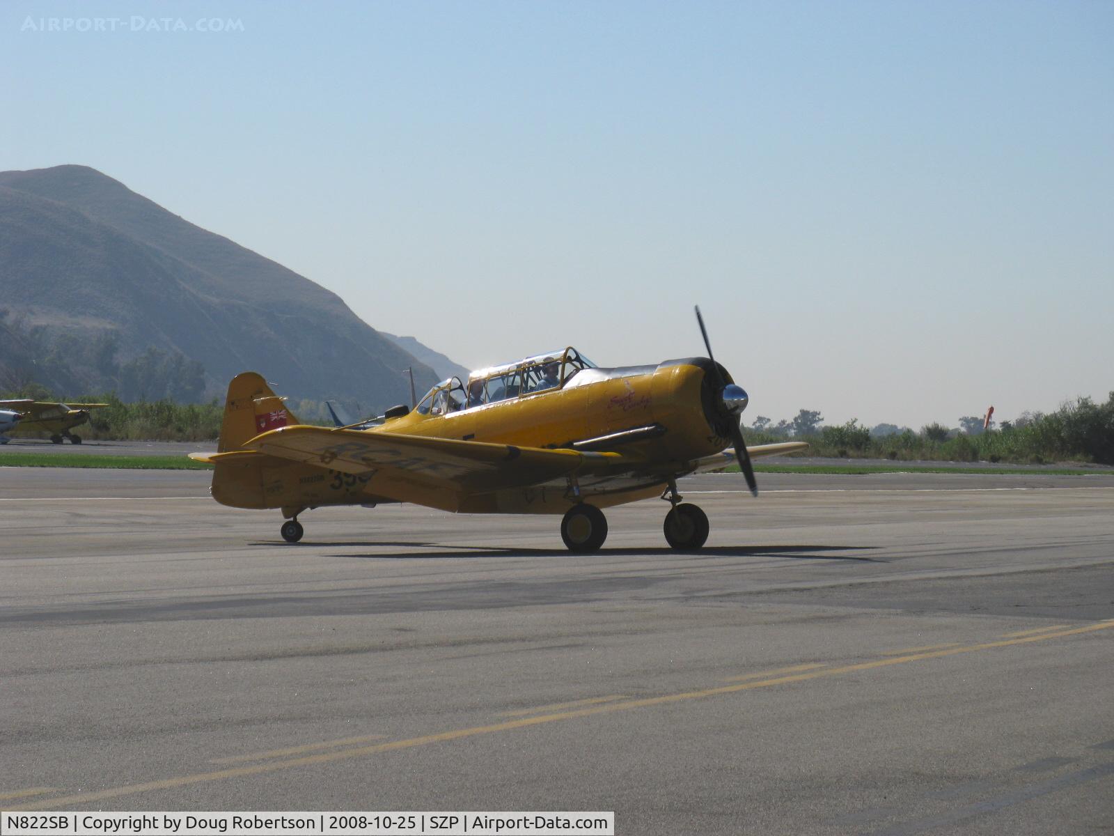 N822SB, 1952 Canadian Car & Foundry Harvard MK IV C/N CCF4-189, 1952 Canadian Car & Foundry HARVARD Mk. IV 'Sweet Candy', P&W R-1340 WASP 600 Hp, taxi turn off Rwy 22