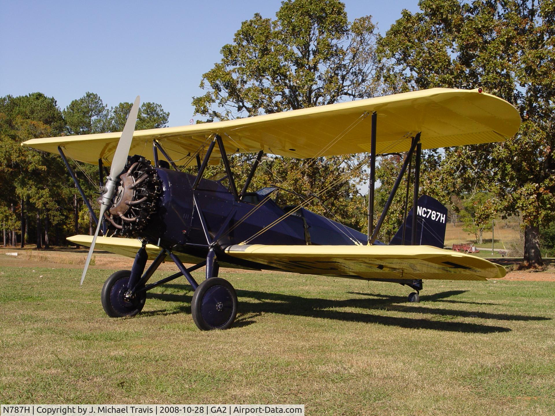 N787H, 1930 Stearman 6L Cloudboy C/N 6002, Stearman at Peachstate Aerodrome.  Note old fire truck in background is right at home with this old timer.
