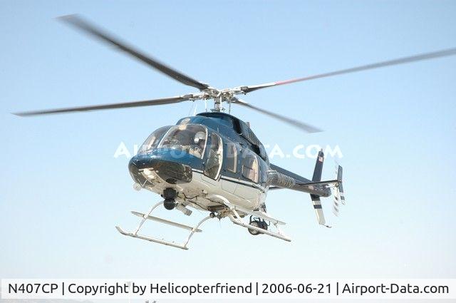 N407CP, 1997 Bell 407 C/N 53095, Landing for static display at IE K-9 program at Chaffey College