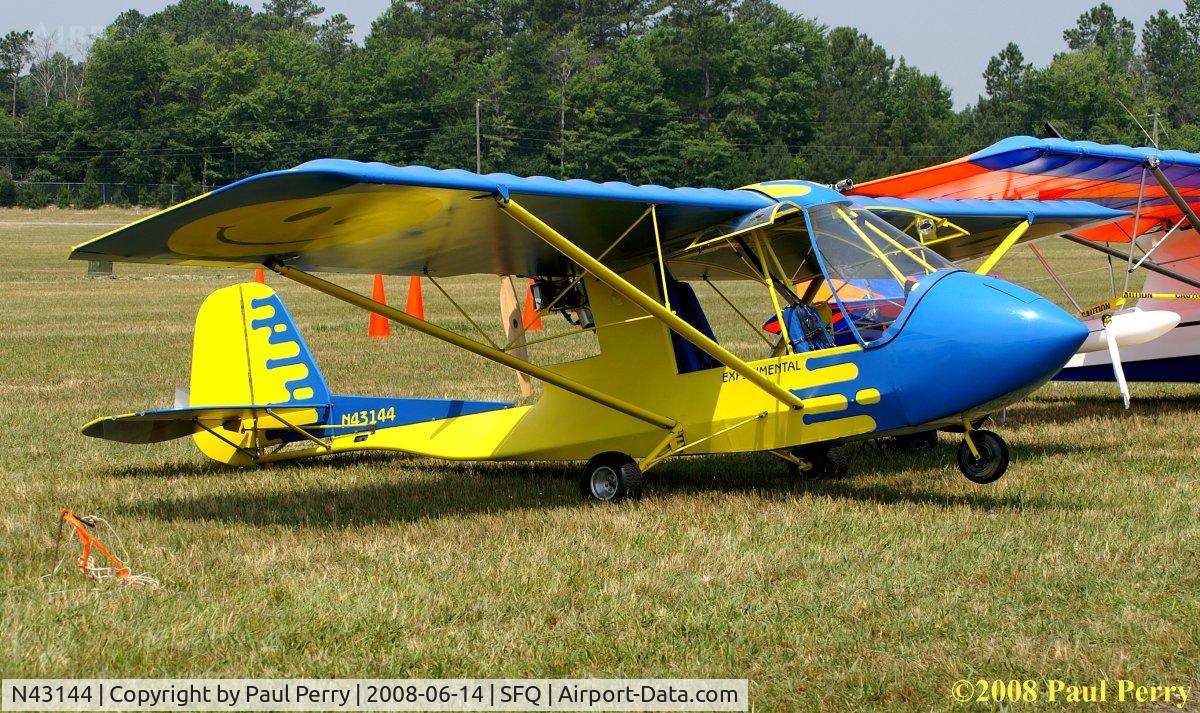 N43144, 1996 Quad City Challenger II Clip Wing C/N CH2-0496-CW-1481, On the light ramp, vibrant to say the least!