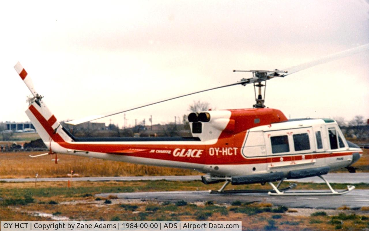 OY-HCT, Bell 212 Twin Huey C/N 31154, At Dallas Addison