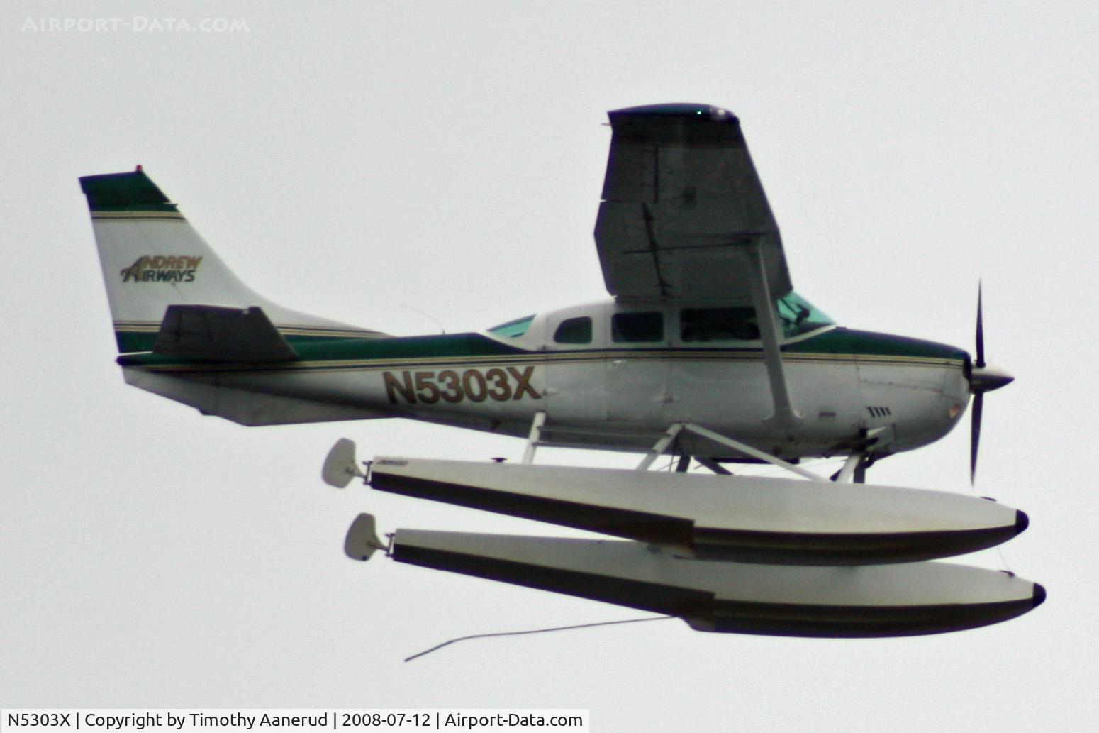 N5303X, 1980 Cessna U206G Stationair C/N U20605622, Andrew Airways Cessna 206 serial U20605622 on straight floats flying by Fort Miller, Kodiak, AK