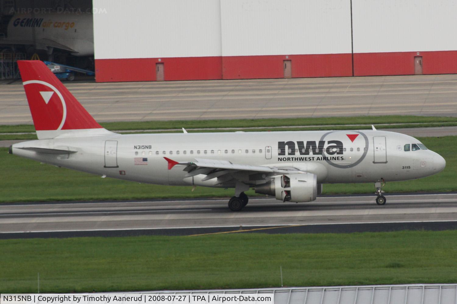 N315NB, 2000 Airbus A319-114 C/N 1230, After taking this picture was taken all of the passengers power up their cell phones to call somebody and say 