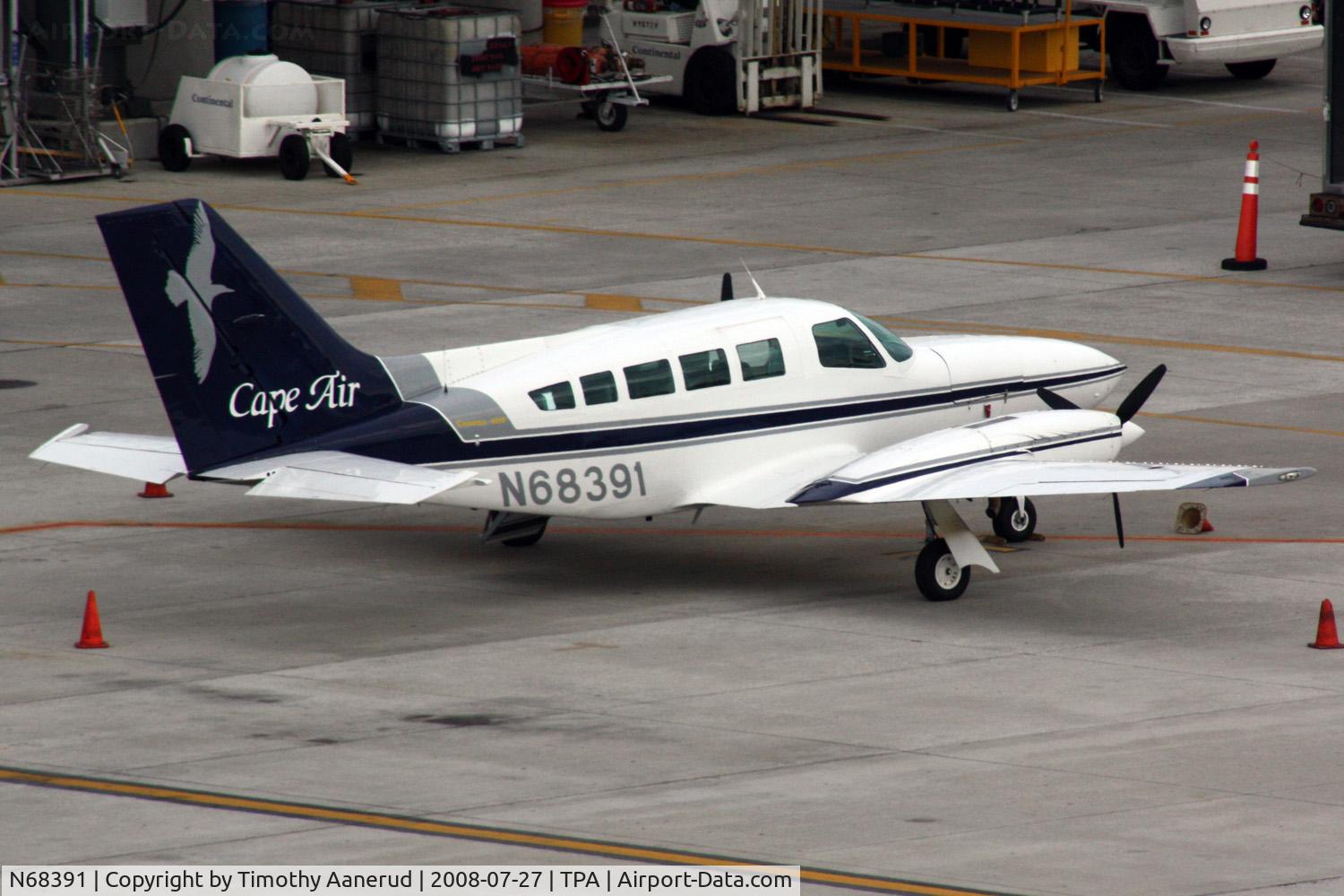 N68391, 1981 Cessna 402C C/N 402C0483, On the ramp at Tampa, taken from the top floor of the parking ramp.  Cessna 402C serial 402C0483