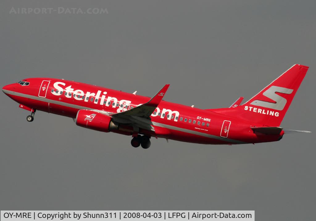 OY-MRE, 1999 Boeing 737-7L9 C/N 28008, On take off with new c/s...