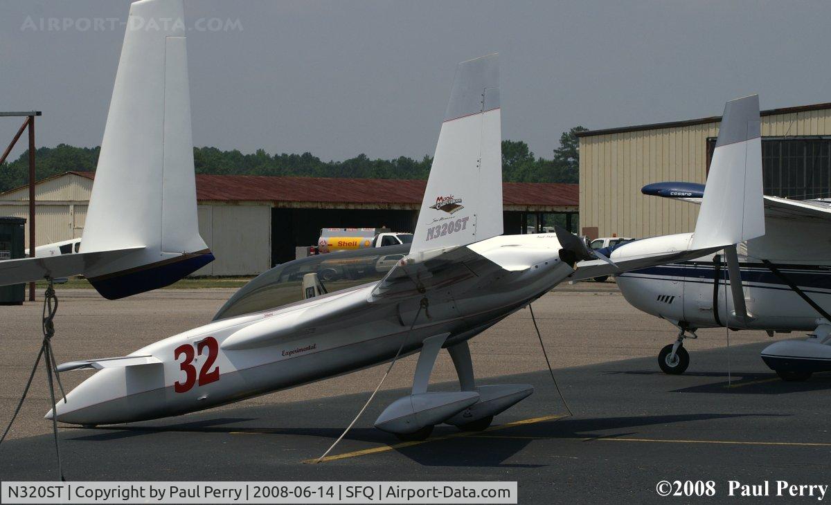 N320ST, 2006 Rutan Long-EZ C/N 1741, Showing off at home.  Nice to catch her out on the ramp