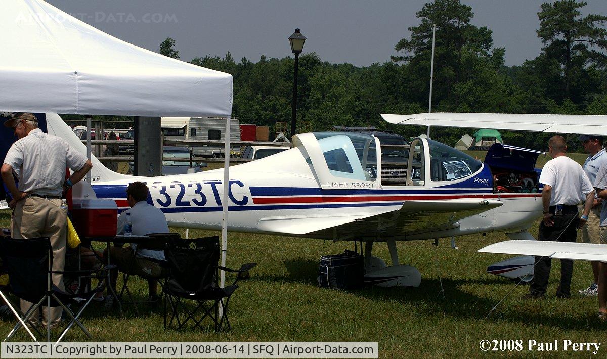 N323TC, 2008 Tecnam P-2002 Sierra C/N 327, All huddled up at the vendor tent