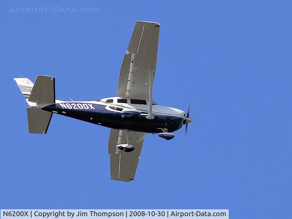 N6200X, 2008 Cessna T206H Turbo Stationair C/N T20608882, Taken with Panasonic Lumix FZ30 at 420mm over Lake Davis in Orlando.