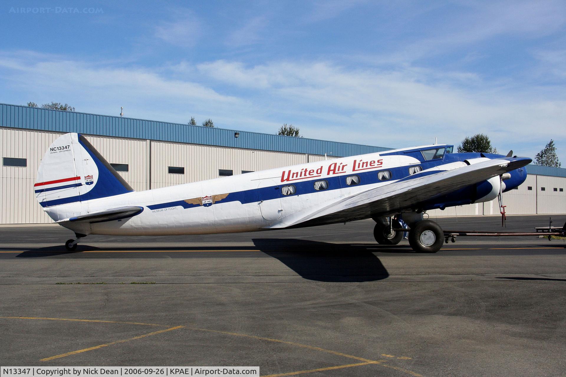 N13347, 1933 Boeing 247D C/N 1729, Being towed past our company hangar