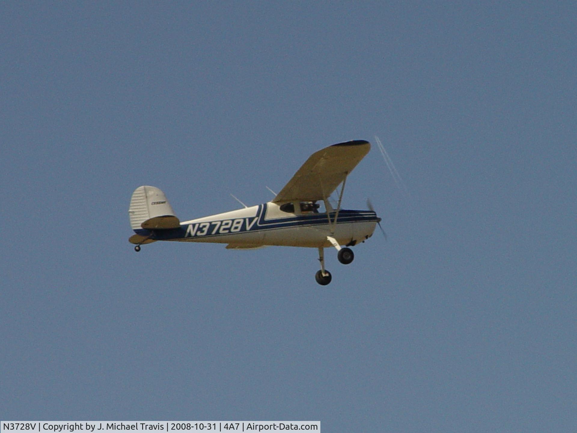 N3728V, 1948 Cessna 140 C/N 15005, Nice 140 at Tara Field for touch n go.  Note contrail above aircraft!